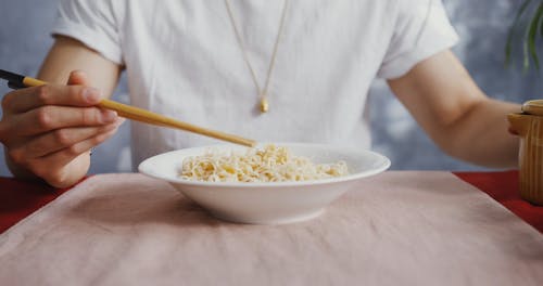 Man Eating Noodle