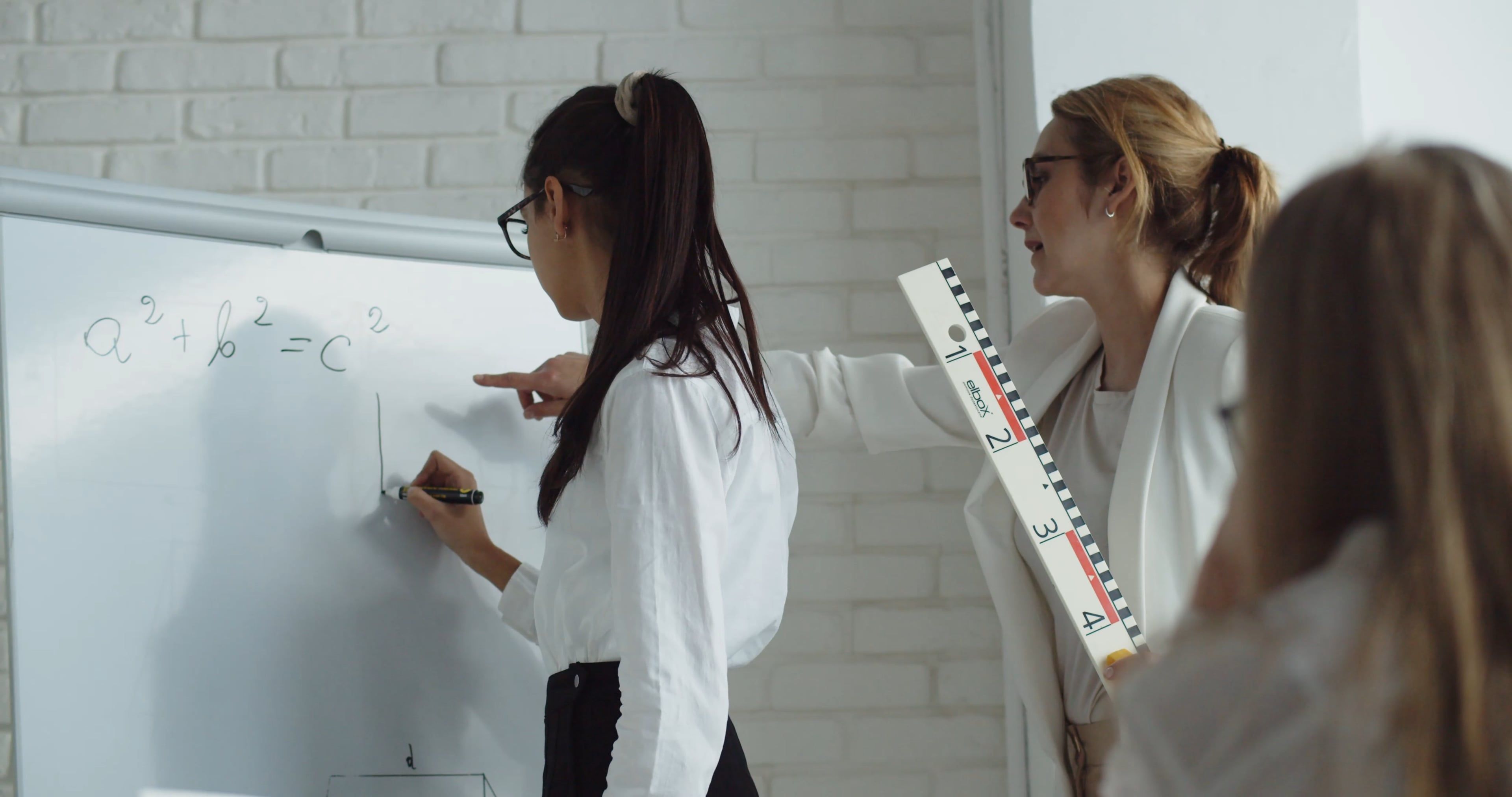 Woman Teaching Students · Free Stock Video
