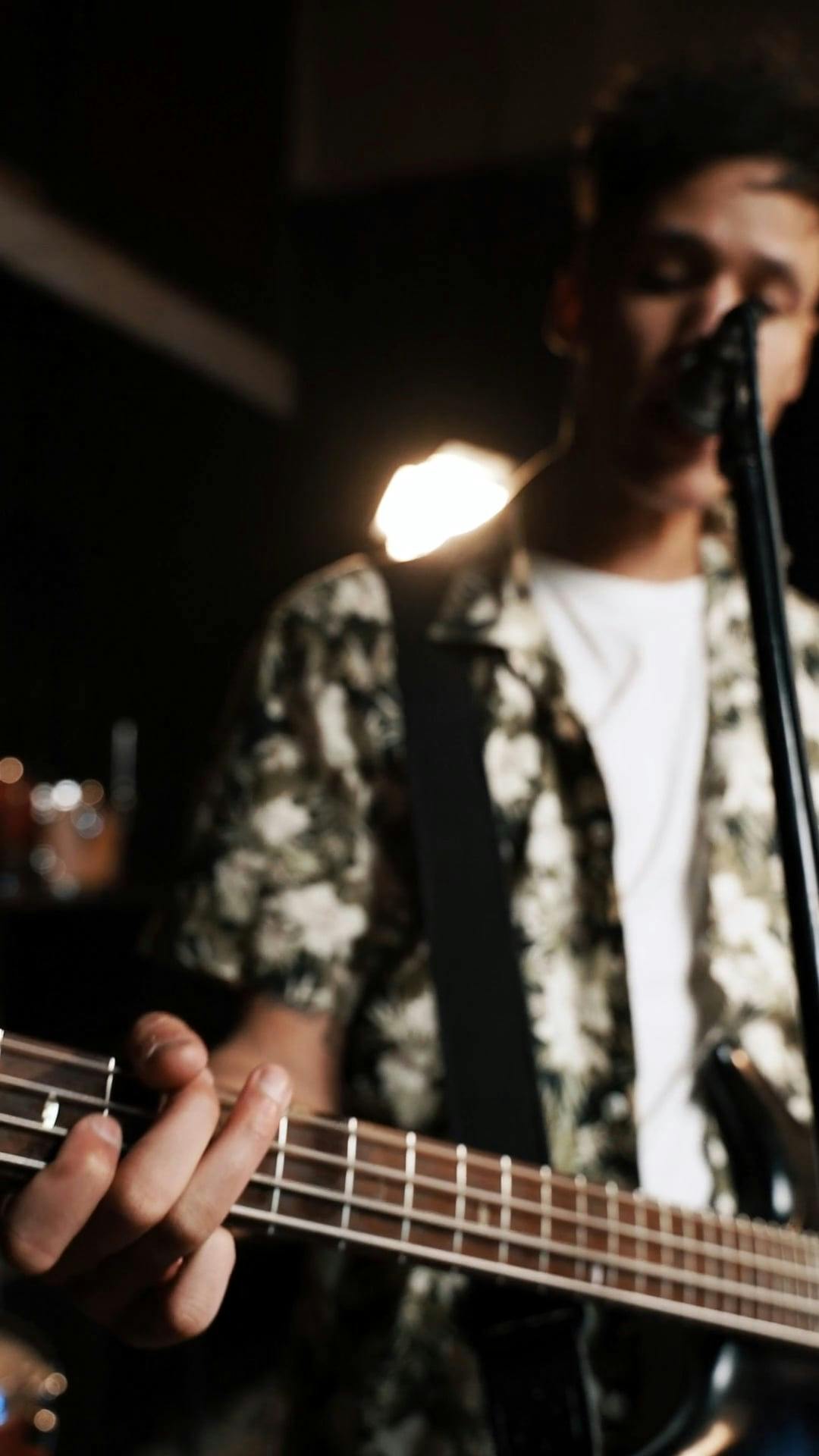 Man Singing while Playing Electric Guitar · Free Stock Video