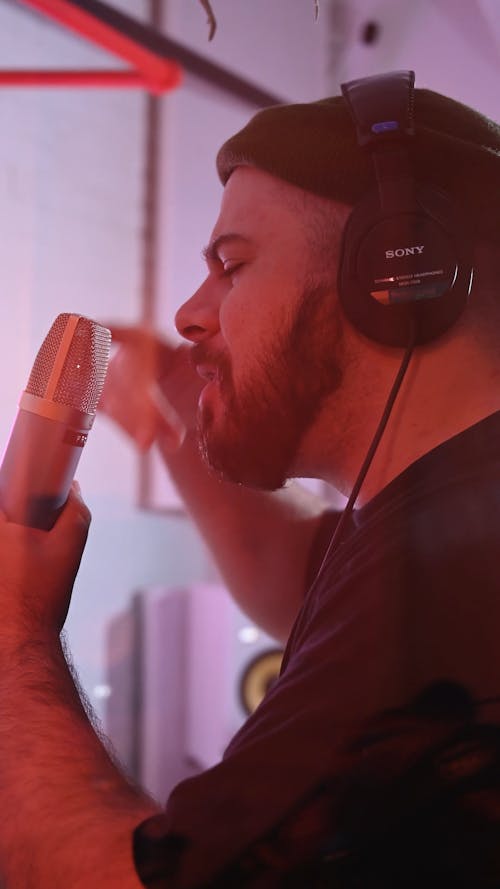 A Man Rapping into a Condenser Microphone