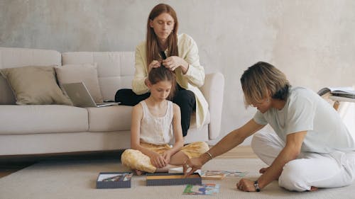 A Family Playing on the Floor