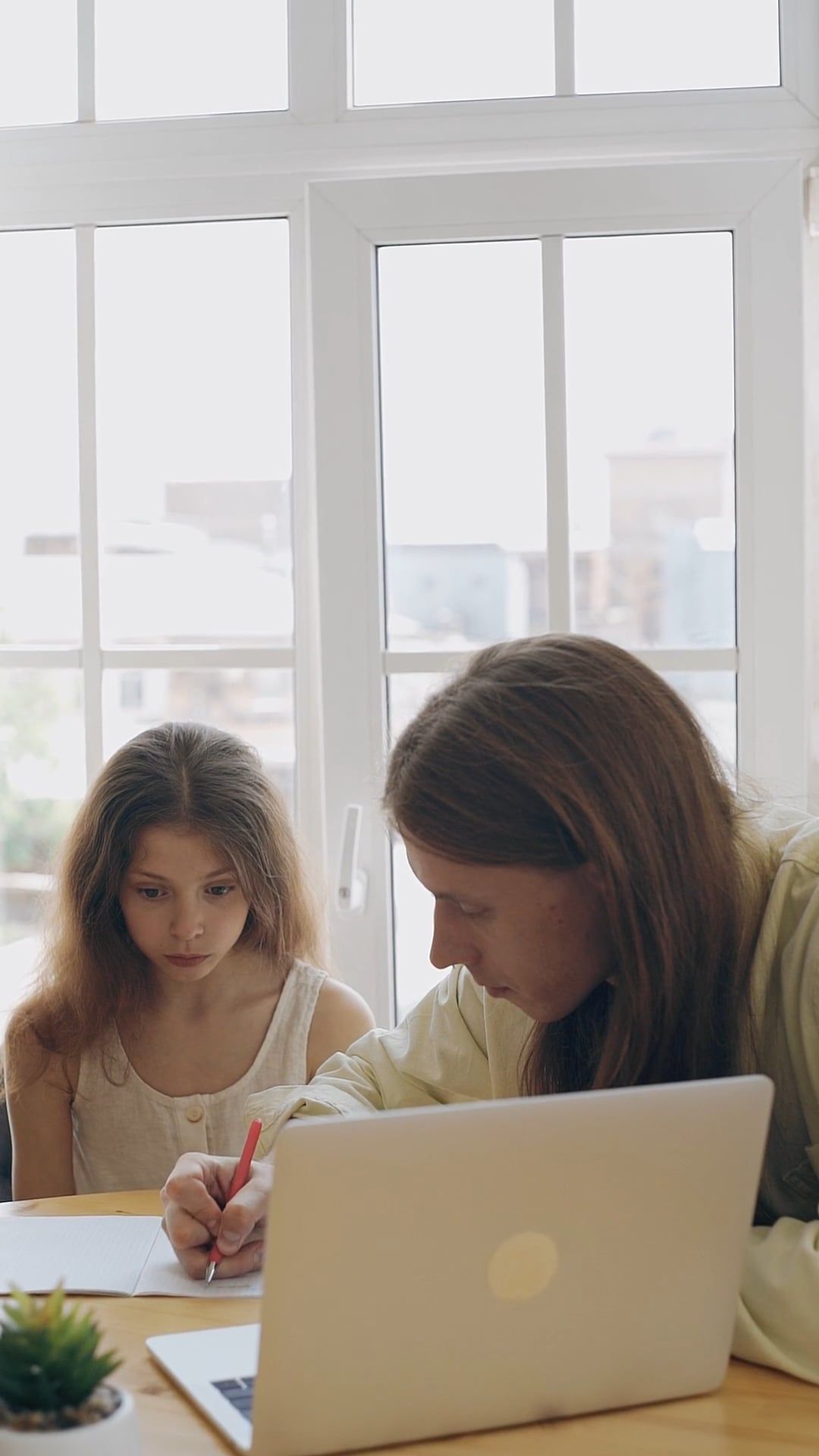 A Mother Teaching Her Daughter With Her Homework Free Stock Video a-mother-teaching-her-daughter-with-her-homework-free-stock-video