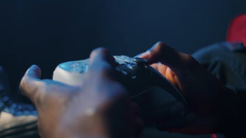 Person Holding a Game Controller