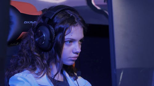 A Teen Girl Playing Computer Games 