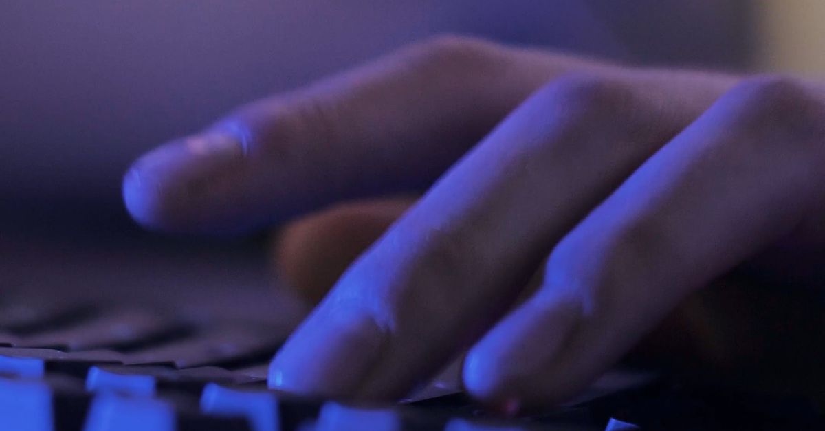 Person Playing Computer Games while using Computer Keyboard Free Stock ...
