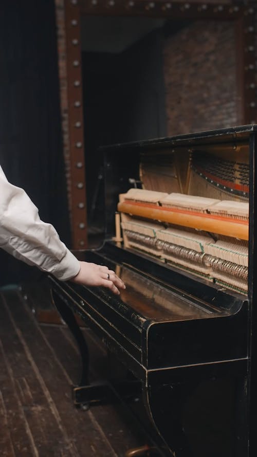 A Blind Man Walking Near to the Piano 