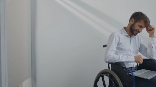 A Man Sitting on Wheelchair