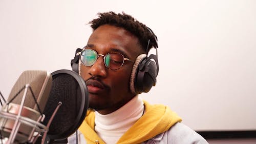 Man Singing in the Music Studio