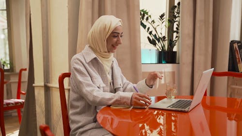 Woman having Videocall using Laptop