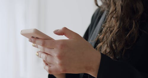 Woman Texting on her Phone