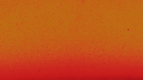 Red Dust in Orange Background