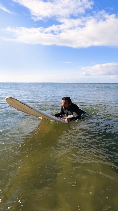 A Man Surfing
