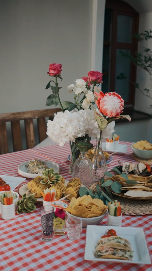 Food and Flowers on a Table 
