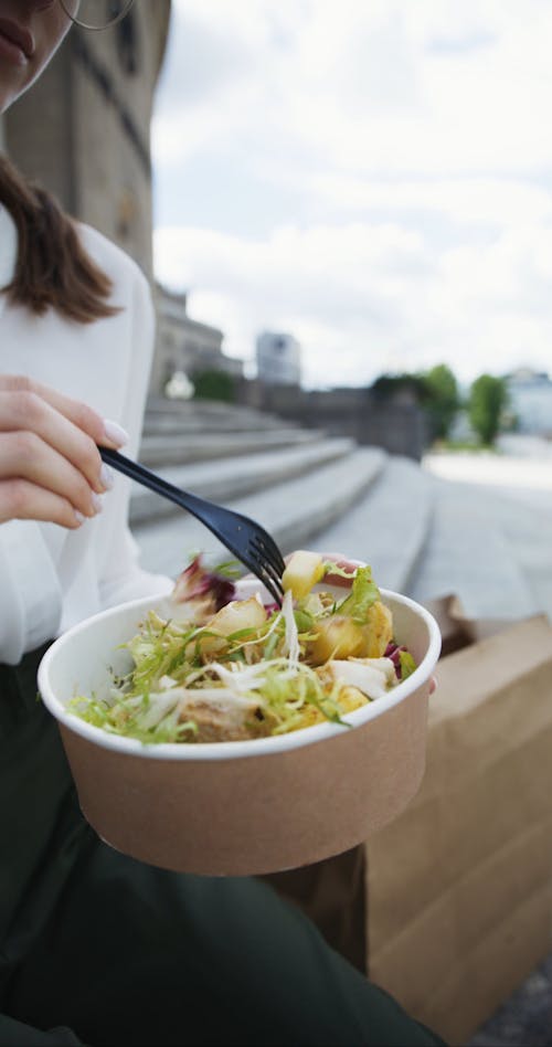 Close Up Shot of Salad Getting Mixed by a Woman