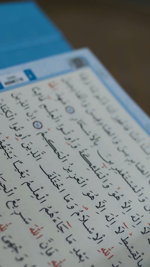 Close Up View of a Book with Arabic Characters