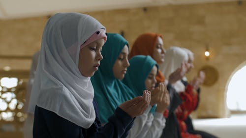 Group of Girls Offering their Prayers