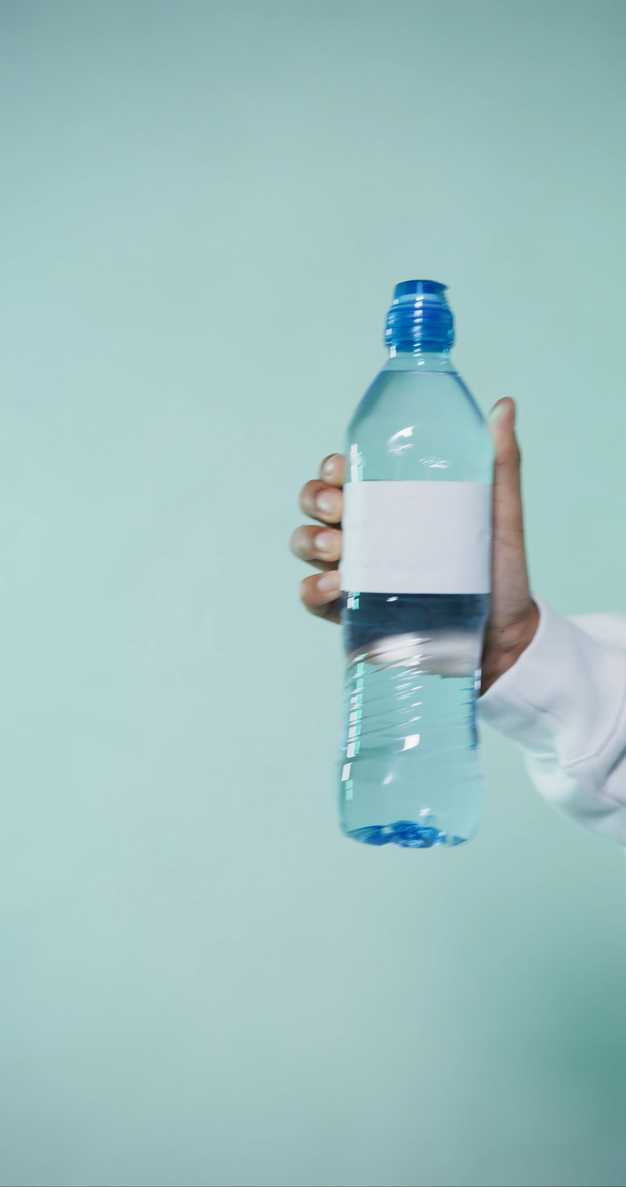 A Person Holding Bottled Water Free Stock Video a-person-holding-bottled-water-free-stock-video