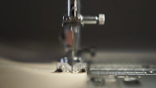 A Person using a Sewing Machine