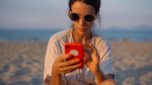 A Woman Using Her Cellphone