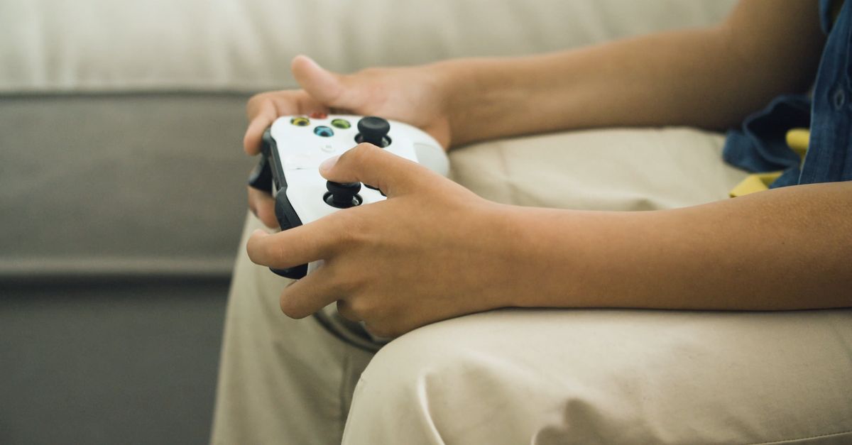 Kid Using Controller A Child Using a Wireless Game Controller Free Stock Video Footage ...