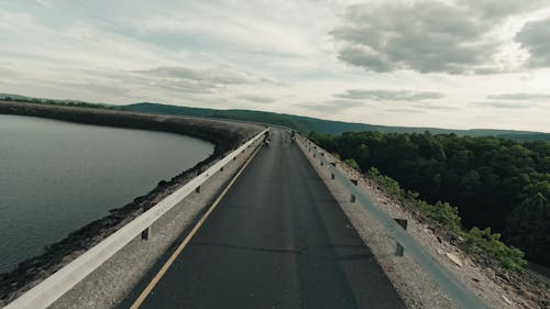 A Drone Footage of People Riding on a Big Bike