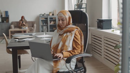 Woman Working at Her Laptop