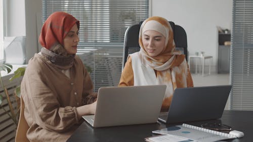 Women Using Laptop at Work