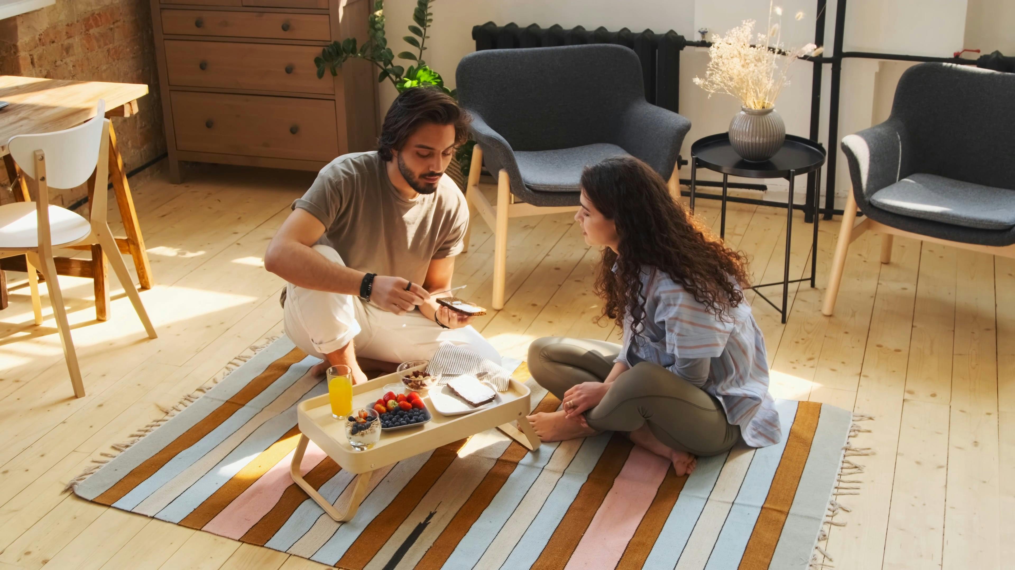 Couple Eating on the Floor · Free Stock Video
