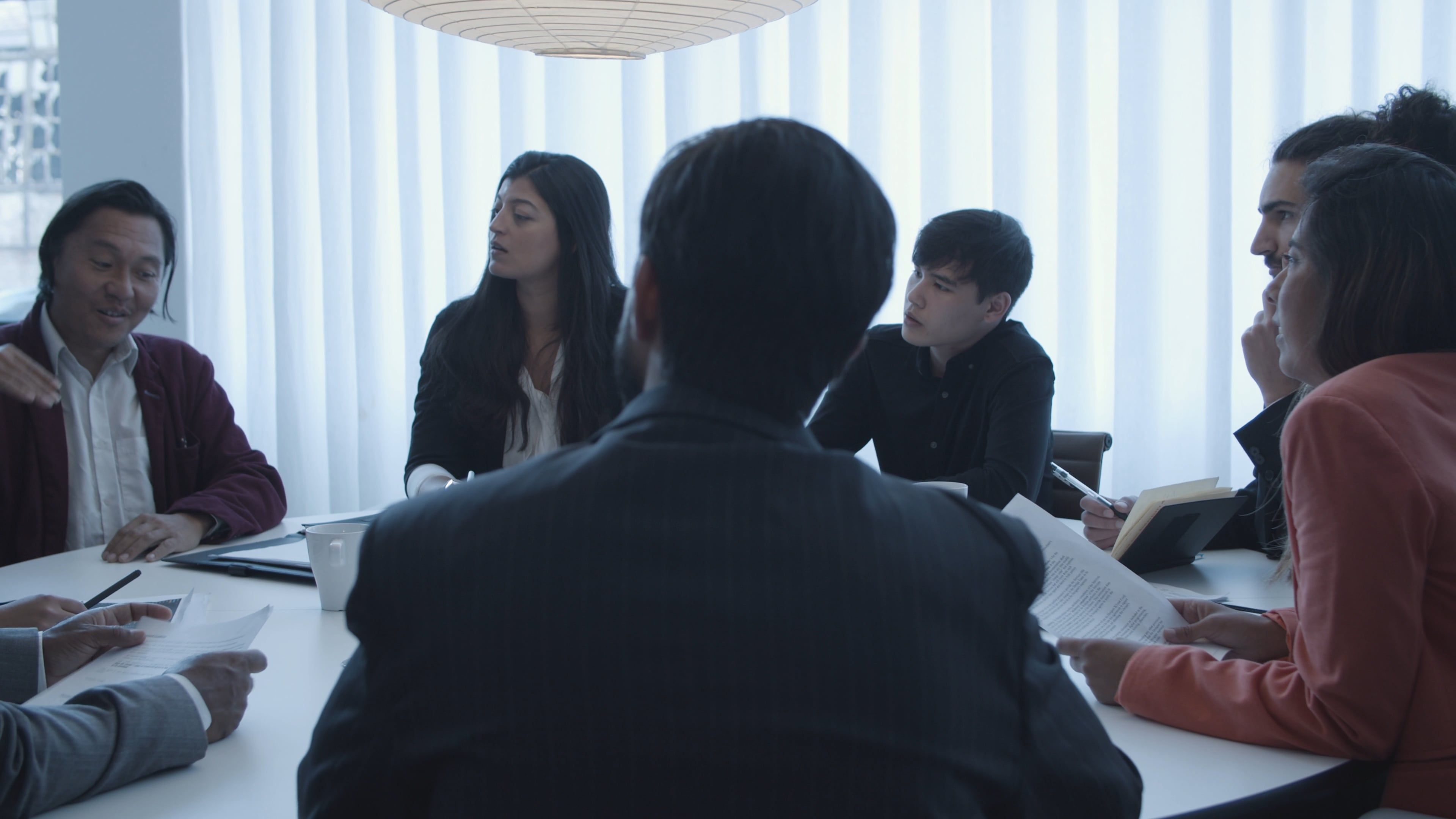 A man explaining with hand gestures during the meeting free stock video
