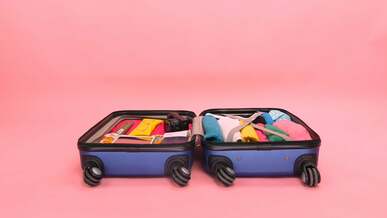 an organized clothes in a luggage