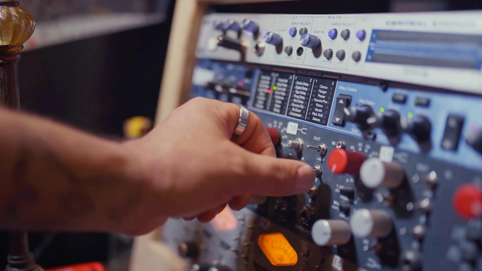 A Person Using an Audio Mixer · Free Stock Video