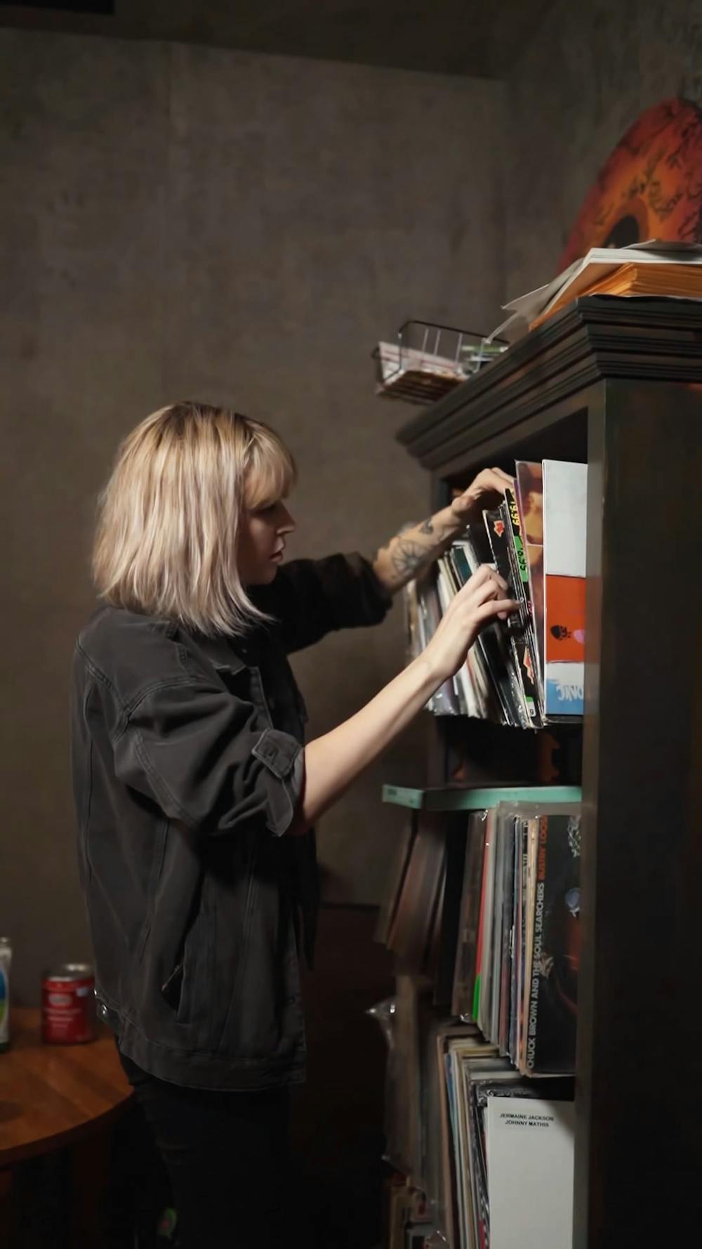 woman-choosing-vinyl-records-free-stock-video