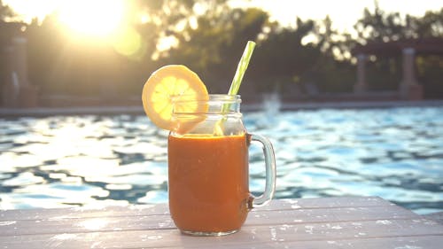 A Glass of Smoothie By the Pool