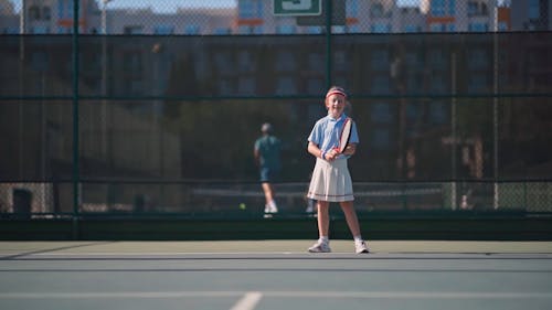 A Girl Playing Tennis