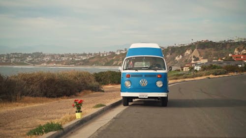 A Man Driving a Camper Van