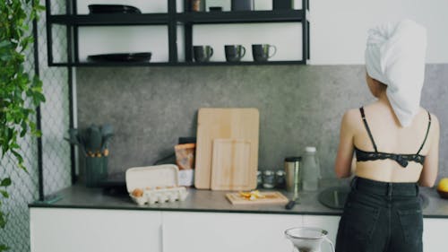 A Woman Washing Dishes