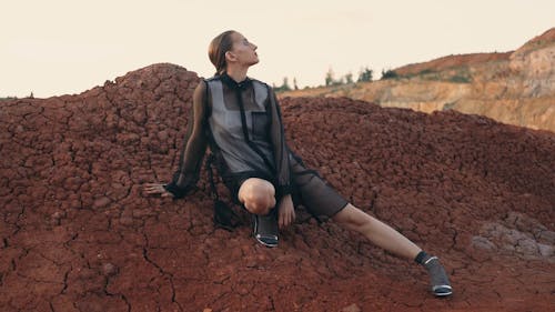 Woman Posing on the Rock Formations