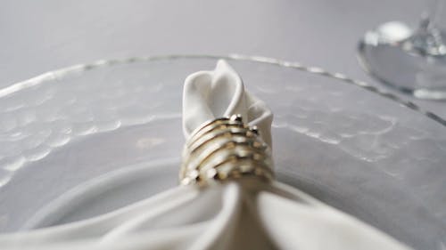 A Table Napkin on a Glass Plate