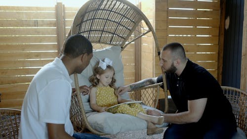 Couple Looking after their Daughter