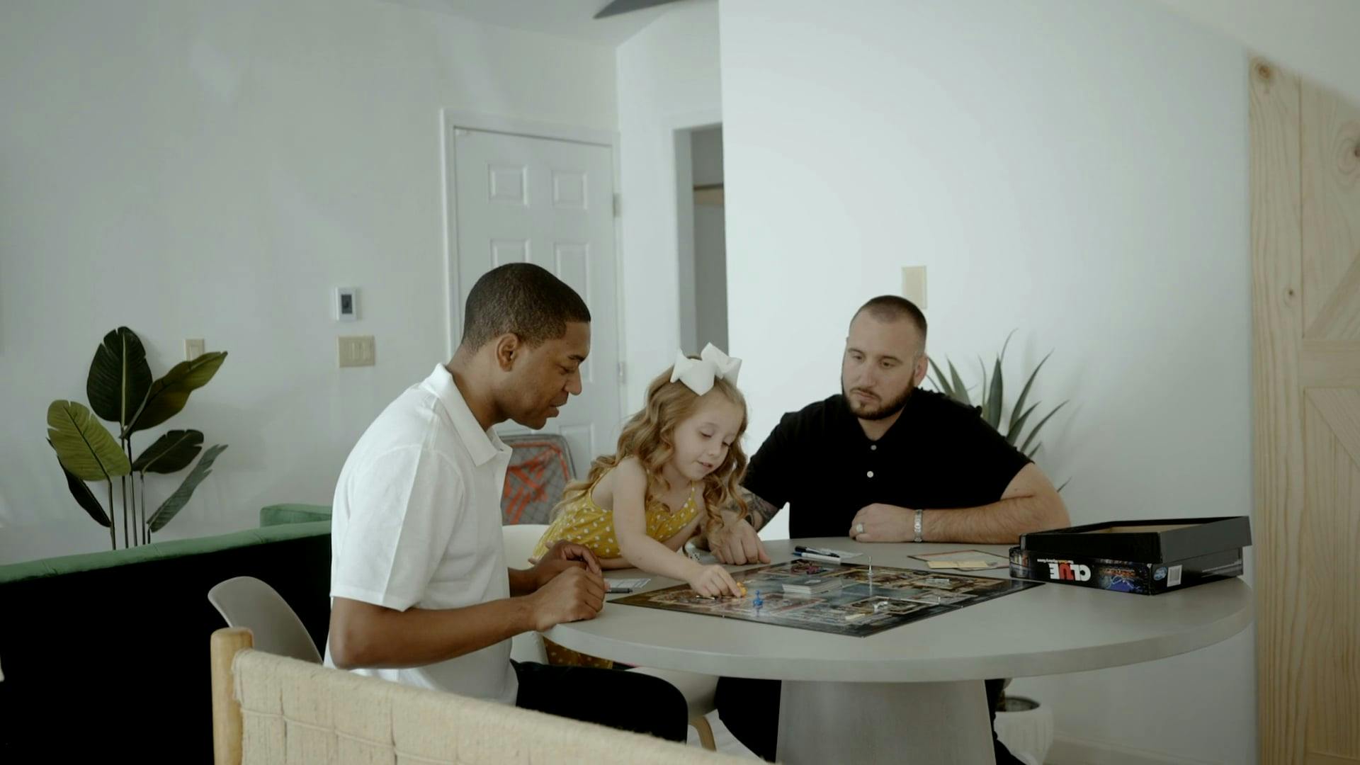 A Family Bonding over a Board Game · Free Stock Video