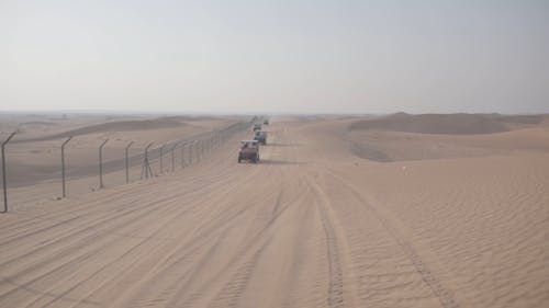 People Riding on a 4x4 Vehicle