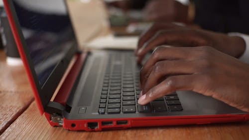 Close-Up Video of a Person Typing on a Keyboard