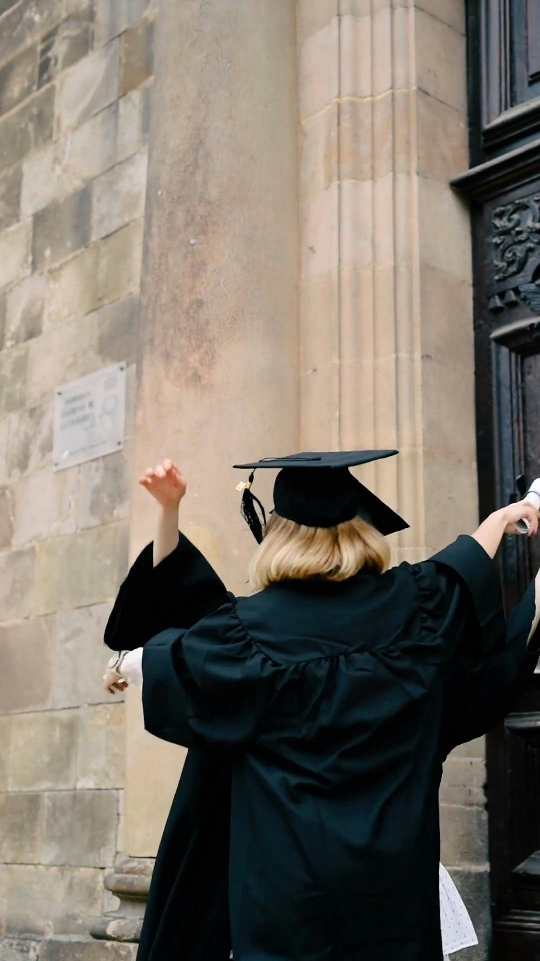 Classmates Wearing Graduation Gown · Free Stock Video