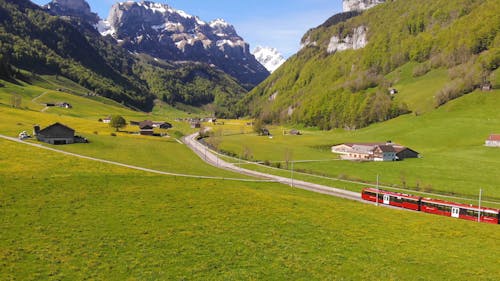 Drone Footage of a Train Traveling on a Valley