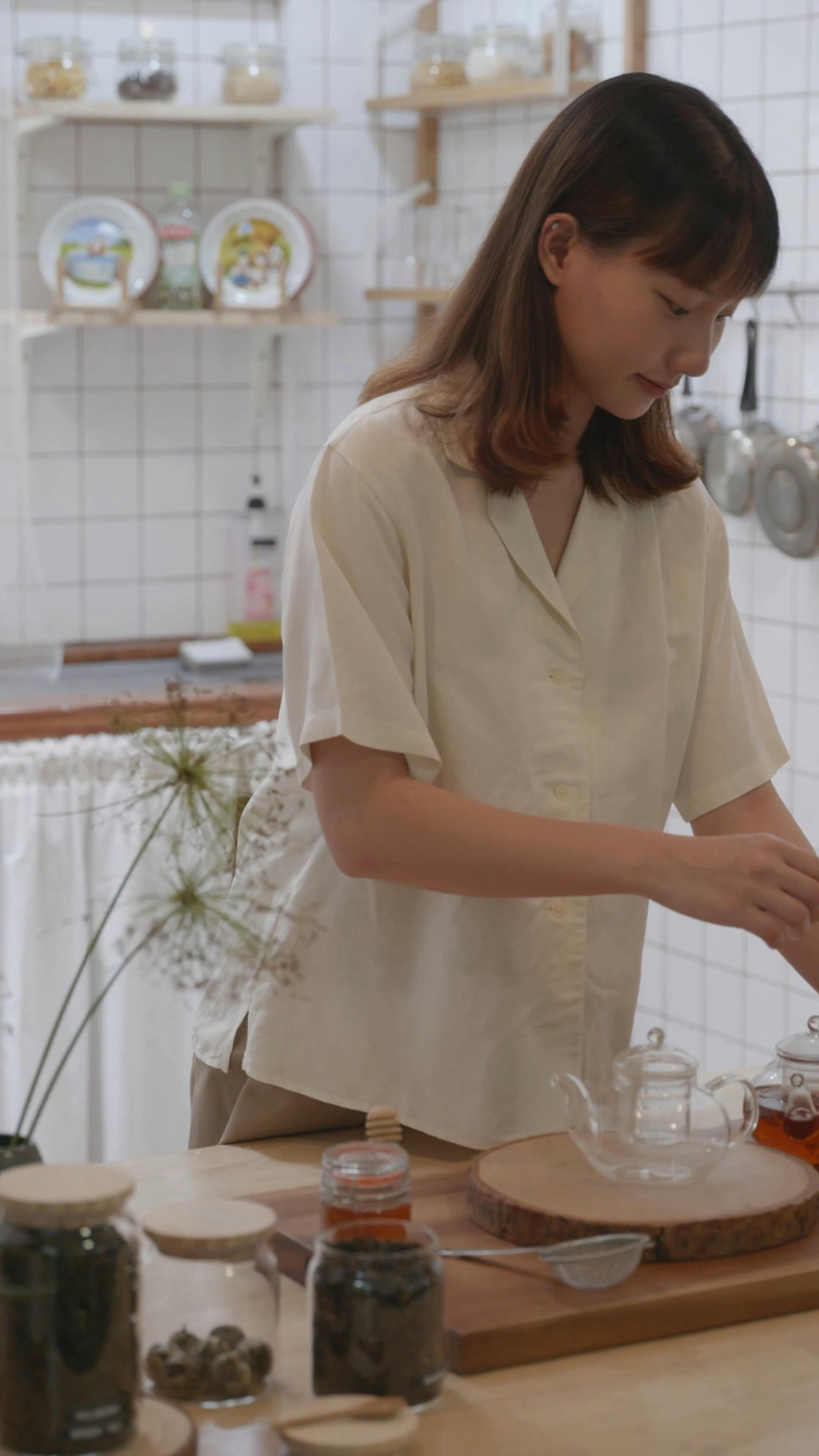 A Woman Preparing a Tea Bag · Free Stock Video