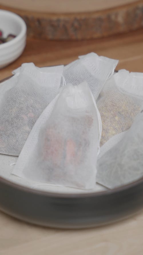 Close up Teabags and a Variety of Ingredients