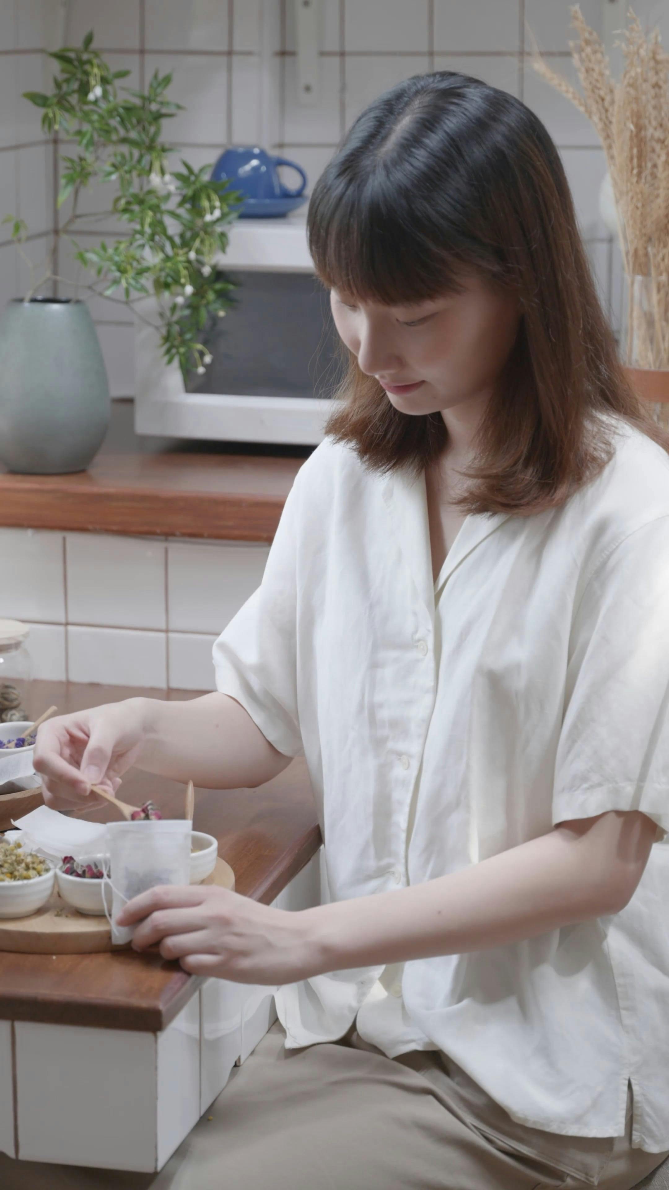 A Woman Preparing Tea Bag · Free Stock Video