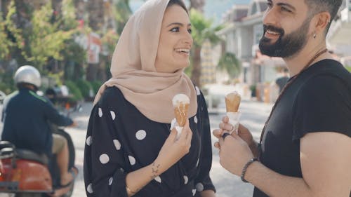 A Couple Eating Ice Cream Cone