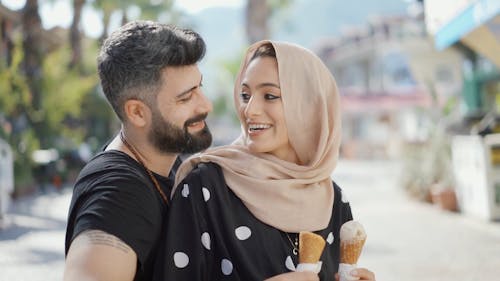 A Couple Holding Ice Cream Cones