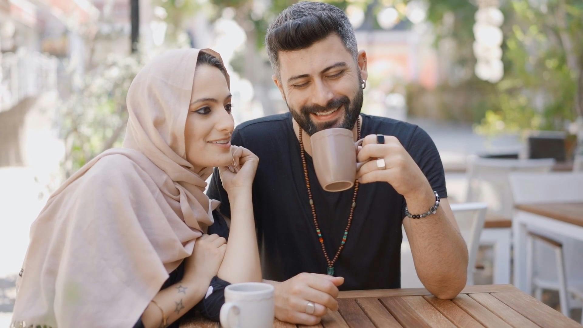 A Couple Talking While Drinking in a Cafe · Free Stock Video